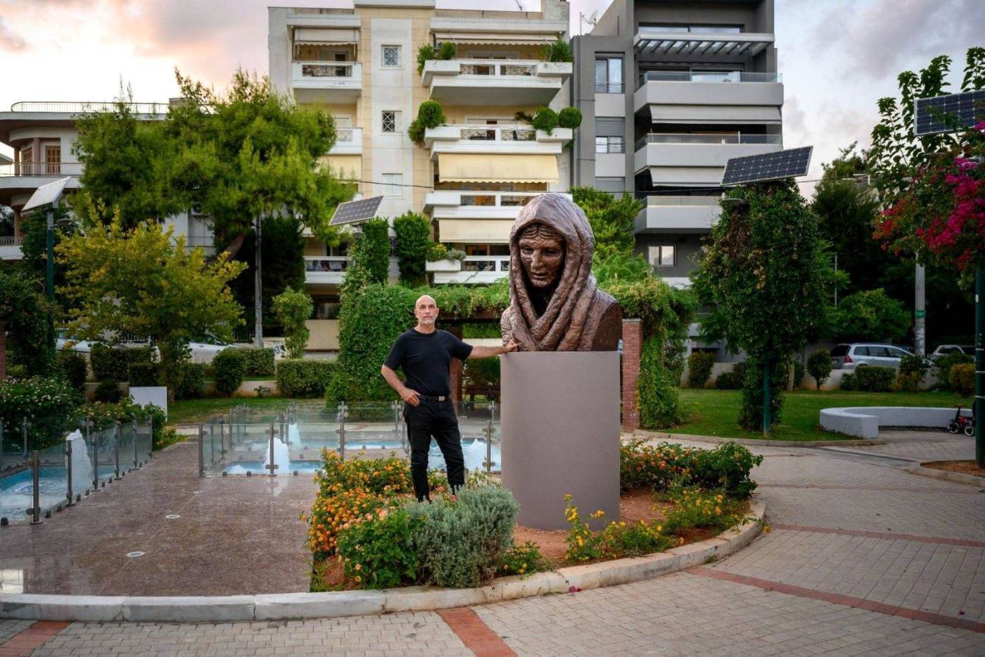 Refugee-Woman of Smyrna, bronze bust in Saint George Square, Neo Psychiko, with the artist