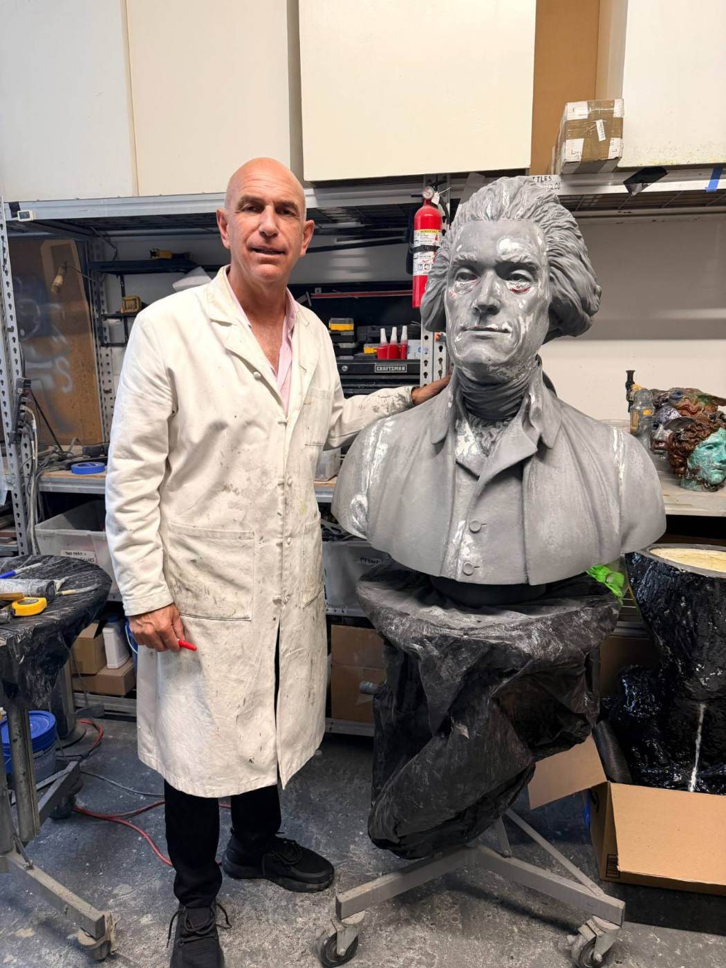 George Petrides with the Jefferson sculpture in his New York studio